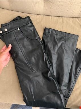 Waist- hugging leather pants